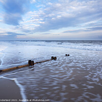 Buy canvas prints of Groynes and Receding Tide on Alnmouth Beach at Dusk by Mark Sunderland
