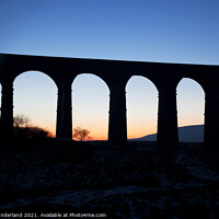 Buy canvas prints of Arches of the Ribblehead Viaduct at Dusk by Mark Sunderland