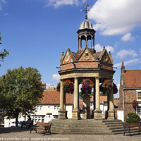 Buy canvas prints of Market Cross with Water Pump in Boroughbridge by Mark Sunderland