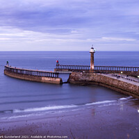 Buy canvas prints of Whitby Piers at Dusk by Mark Sunderland