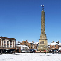 Buy canvas prints of Ripon Market Place in Winter by Mark Sunderland