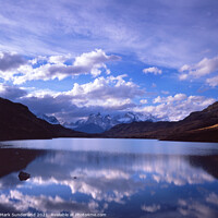 Buy canvas prints of Clouds Reflections in the Rio Paine by Mark Sunderland