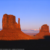 Buy canvas prints of The Mittens at Sunset Monument Valley by Mark Sunderland