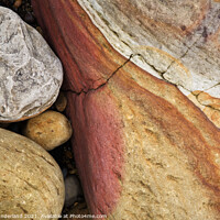 Buy canvas prints of Colourful Stones on the Beach at Hayburn Wyke by Mark Sunderland