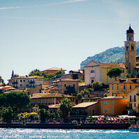 Buy canvas prints of Limone Sul Garda - Lake view with building and boat by Jonathan Campbell