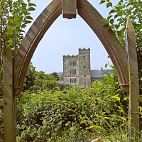 Buy canvas prints of Pengersick Castle, Garden And Wooden Arch Cornwall by Ernest Sampson