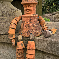 Buy canvas prints of The Flowerpot Man Is Broken, He's All Gone To Pot. by Ernest Sampson