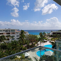 Buy canvas prints of Sint Maarten Philipsburg April 20 2021 view of Sonesta Maho Beach Resort's apartments. Beautiful blue sky and ocean by Anish Punchayil Sukumaran