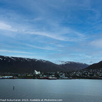 Buy canvas prints of Snowy Tranquil Mountain Lake in Tromso, Norway by Anish Punchayil Sukumaran