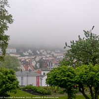 Buy canvas prints of a view of beautiful houses in Norway Bergan partially covered in fog by Anish Punchayil Sukumaran