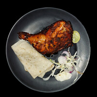 Buy canvas prints of Fleshly cook barbecue chicken with rumali roti and mixed salad by Anish Punchayil Sukumaran