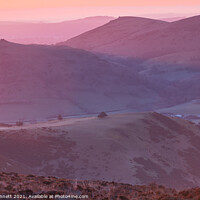 Buy canvas prints of Sunrise from the Long Mynd over the Shropshire Hil by Alan Dunnett