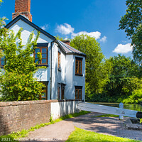 Buy canvas prints of Lock Keepers Cottage by Alan Dunnett