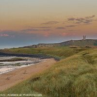 Buy canvas prints of Dunstanburgh Castle and beach by Alan Dunnett