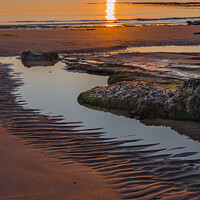 Buy canvas prints of Sunrise and shadows on Embleton Beach, Northumbria by Alan Dunnett