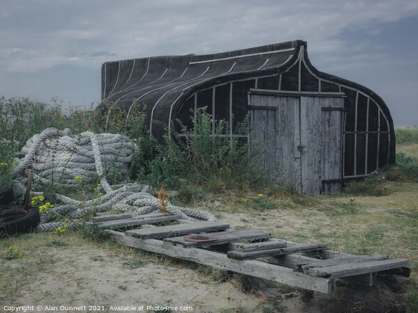 Holy Island Boat shed Picture Board by Alan Dunnett