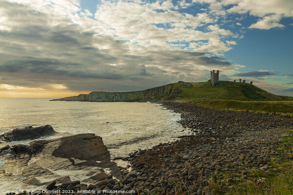 Coastal Haven: Dunstanburgh Castle Picture Board by Alan Dunnett