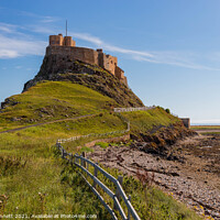 Buy canvas prints of Lindisfarne Castle on the coast by Alan Dunnett