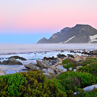 Buy canvas prints of Dusk over ocean at Bettys Bay, South Africa by Pieter Marais