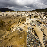 Buy canvas prints of Dramatic cloudy sky above white marble rocks on Camas Malag beach, near Torrin, Isle of Skye, Scotland by Photimageon UK