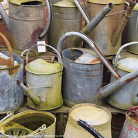 Buy canvas prints of Assorted old metal watering cans and buckets by Photimageon UK