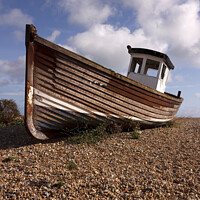 Buy canvas prints of Old wooden fishing boat on beach, Eastbourne by Photimageon UK