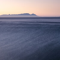 Buy canvas prints of Cape Town at sunset over False Bay, South Africa by Neil Overy