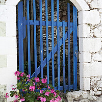 Buy canvas prints of Old Blue Greek Door with flowers, Corfu, Greece by Neil Overy