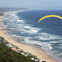 Buy canvas prints of Parasailing over Wilderness Beach, South Africa by Neil Overy