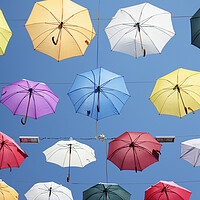 Buy canvas prints of Colorful Umbrellas by Neil Overy