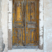 Buy canvas prints of Old Wooden Yellow Door in Greece by Neil Overy