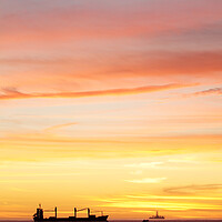Buy canvas prints of Sunset over ships waiting to enter Cape Town Harbour by Neil Overy
