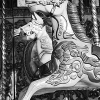 Buy canvas prints of Horses from a Carousel in Black and White, Brighton, Sussex by Neil Overy