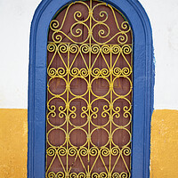Buy canvas prints of Colorful old wooden window shutter, Kastellorizo, Greece by Neil Overy