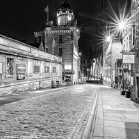 Buy canvas prints of Monochrome View of the Royal Mile Edinburgh. by Philip Leonard