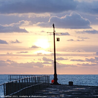 Buy canvas prints of Porthleven Pier Winter Sunset by John Whitehead