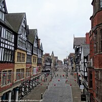 Buy canvas prints of Almost deserted street in Chester on Christmas Day by Joan Rosie