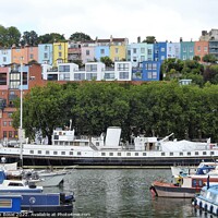 Buy canvas prints of MV Balmoral moored below rows of coloured houses in the floating harbour, Bristol by Joan Rosie