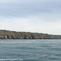 Buy canvas prints of The west side of Lundy viewed from the sea by Joan Rosie