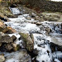 Buy canvas prints of Frozen waterfall Angle Tarn Beck in Cumbria by Angela Lilley