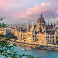 Buy canvas prints of Budapest parliament and Danube river at sunset by Delphimages Art