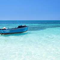 Buy canvas prints of Blue boat on pristine water on the beach in Cuba by Delphimages Art