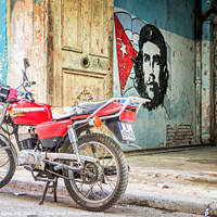 Buy canvas prints of Che Guevara stencil and motorbike in Havana Cuba by Delphimages Art