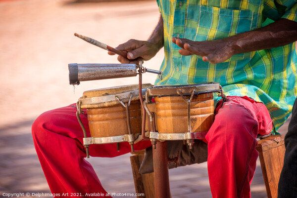 Cuba. Street musician playing drums in Trinidad Picture Board by Delphimages Art