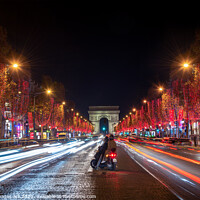 Buy canvas prints of Christmas lights at night in Paris Champs Elysees by Delphimages Art