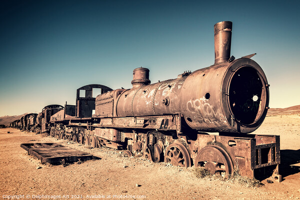Old rusty train cemetery in Uyuni, Bolivia Picture Board by Delphimages Art