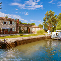 Buy canvas prints of Canal du Midi France. Tourism boat at a lock by Delphimages Art