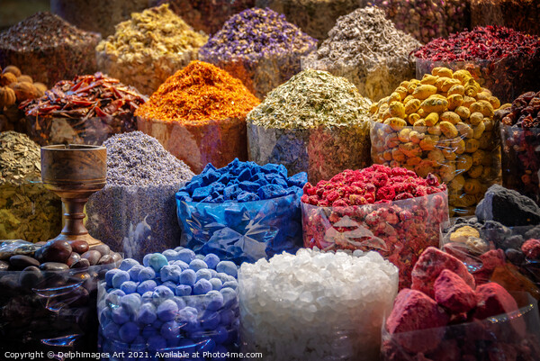 Colourful piles of spices in Dubai old souk, UAE Picture Board by Delphimages Art