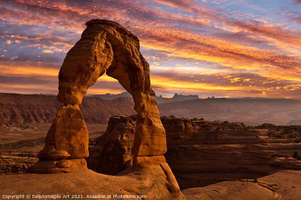 Arches National Park. Delicate arch at sunset Picture Board by Delphimages Art