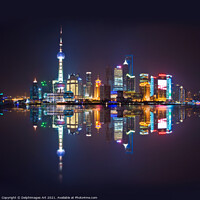 Buy canvas prints of Shanghai skyline at night reflections in the river by Delphimages Art